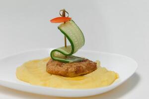 mashed potatoes with cutlet. children's menu photo