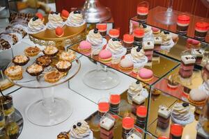 various dessert with fresh fruit on buffet line, sweet. photo