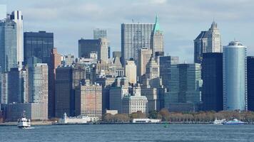 The New York manhattan view from the ferry boat in the sunny day photo