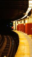 The city subway view with the old platform and lights on in the New York city photo