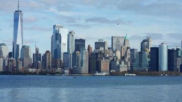 The New York manhattan view from the ferry boat in the sunny day photo