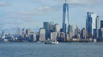 The New York manhattan view from the ferry boat in the sunny day photo