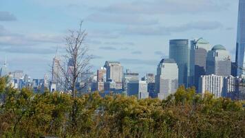 The beautiful New York city view with the colorful autumn trees and buildings as background in autumn photo