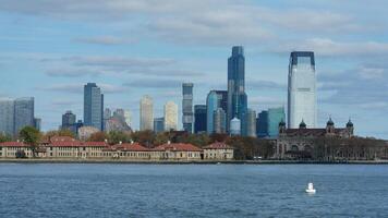 The New York manhattan view from the ferry boat in the sunny day photo