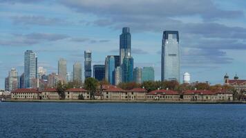 The New York manhattan view from the ferry boat in the sunny day photo