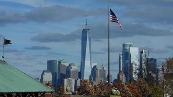 The beautiful New York city view with the colorful autumn trees and buildings as background in autumn photo