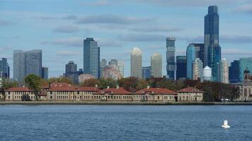 The beautiful New York city view with the colorful autumn trees and buildings as background in autumn photo