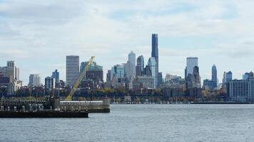 The New York manhattan view from the ferry boat in the sunny day photo