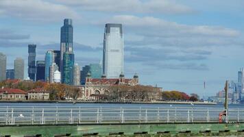 The New York manhattan view from the ferry boat in the sunny day photo