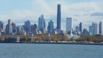 The New York manhattan view from the ferry boat in the sunny day photo