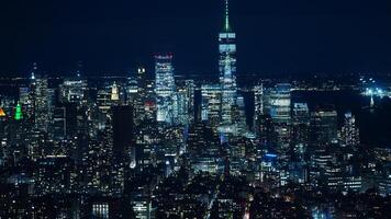 The New York city night view with the lights on in the skyscrapers at night photo