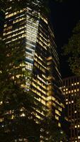 The New York city night view with the lights on in the skyscrapers at night photo