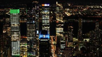 The New York city night view with the lights on in the skyscrapers at night photo