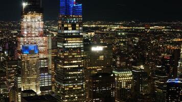 The New York city night view with the lights on in the skyscrapers at night photo