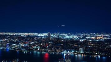 The New York city night view with the lights on in the skyscrapers at night photo