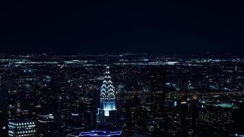 The New York city night view with the lights on in the skyscrapers at night photo