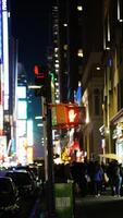 The New York city night view with the lights on in the skyscrapers at night photo