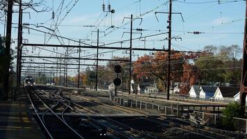 The train station view with the iron tracks near the platform photo