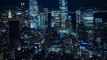The New York city night view with the lights on in the skyscrapers at night photo