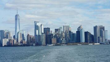 The New York manhattan view from the ferry boat in the sunny day photo