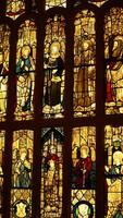 The church windows view with the religious glass drawings on them photo