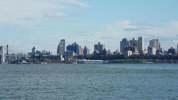 The New York manhattan view from the ferry boat in the sunny day photo