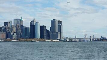 The New York manhattan view from the ferry boat in the sunny day photo
