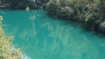 The beautiful lake landscapes with the green forest as background in the countryside of the China photo