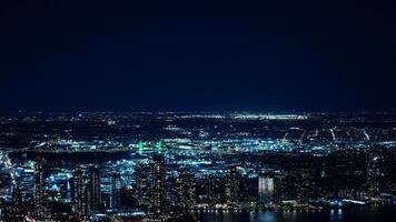 The New York city night view with the lights on in the skyscrapers at night photo