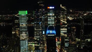 The New York city night view with the lights on in the skyscrapers at night photo