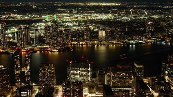 The New York city night view with the lights on in the skyscrapers at night photo