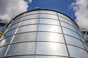 silos on agro-industrial complex with seed cleaning and drying line for grain storage. Granary elevator photo