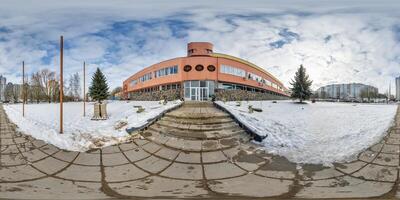 winter hdri 360 panorama view near an old soviet brutalist building and urban development in equirectangular seamless spherical projection, AR VR content photo
