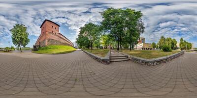 hdri 360 panorama near huge neo-gothic castle, defensive fortification and residence in full seamless spherical equirectangular projection with zenith ready for VR virtual reality content photo
