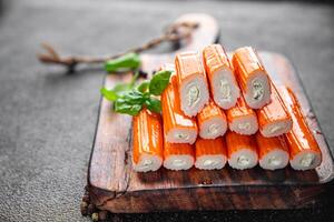 crab stick stuffing cream cheese and herbs natural fresh appetizer meal food snack on the table copy space food background rustic top view photo