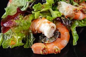 shrimp salad prawns or langoustines green leaf lettuce mix fresh meal food snack on the table copy space food background rustic top view photo