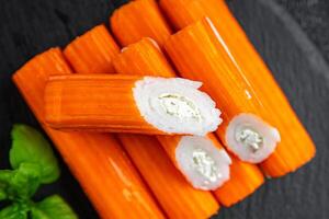crab stick stuffing cream cheese and herbs natural fresh appetizer meal food snack on the table copy space food background rustic top view photo