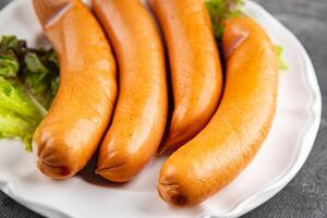 sausages meat pork or chicken, turkey fresh meal food snack on the table copy space food background rustic top view photo