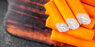 crab stick stuffing cream cheese and herbs natural fresh appetizer meal food snack on the table copy space food background rustic top view photo
