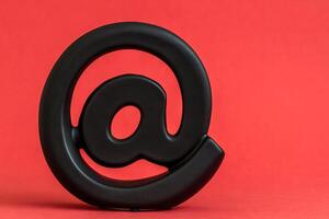 Black logo with a black letter A, symbol for the internet and is meant to represent the idea of communication and connection. photo