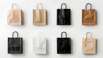 Paper bags arranged in a neat grid on a plain white background. photo