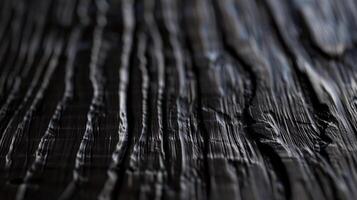 Texture of black wood grain. photo