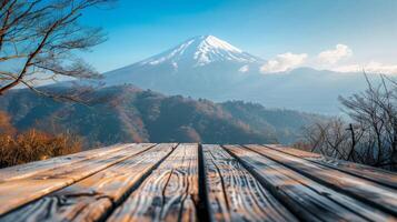 Empty wooden table showing majestic mount fuji in background photo