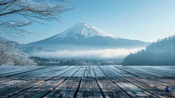 Empty wooden table top with mount fuji background in winter photo