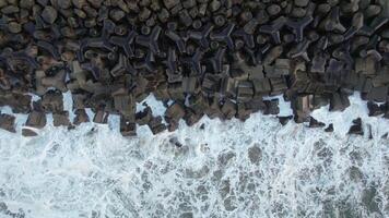 Sea Waves Crashing on the Pier Aerial View video