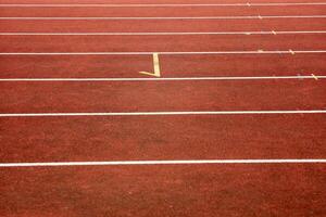 synthetic track with marks in the athletics stadium photo