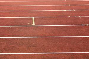 synthetic track with marks in the athletics stadium photo