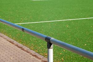 barrier at an artificial turf pitch photo