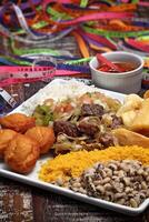 Bahian dish with acaraje, abara, caruru and vinaigrette sauce photo