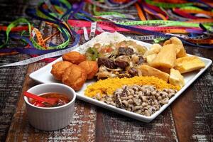 Bahian dish with acaraje, abara, caruru and vinaigrette sauce photo